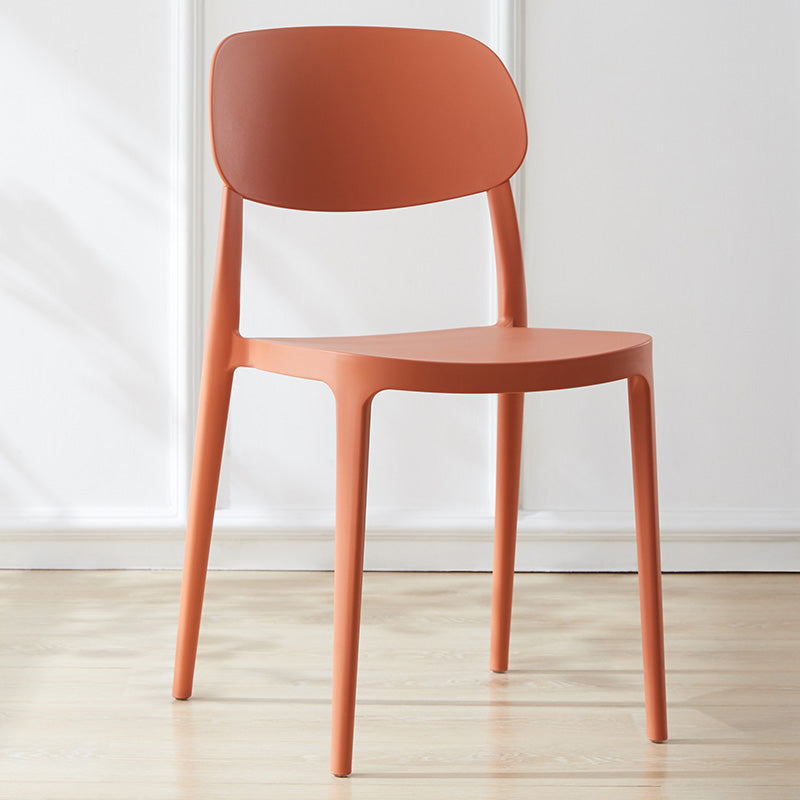 Silla lateral abierta apilable de cena sin brazos del plástico escandinavo de las sillas