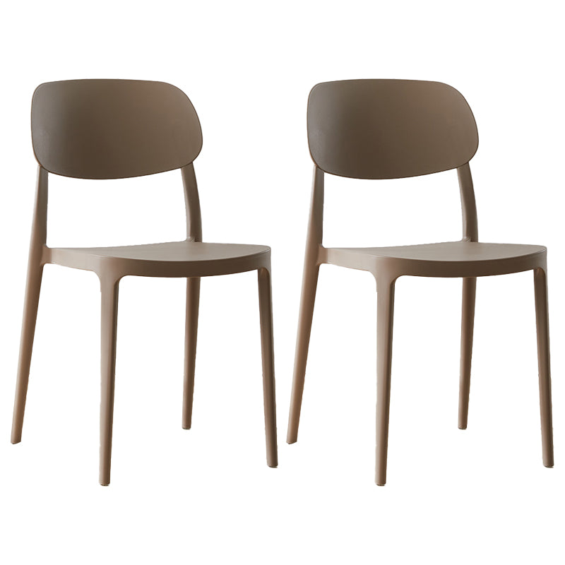 Silla lateral abierta apilable de cena sin brazos del plástico escandinavo de las sillas