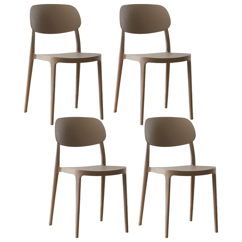 Silla lateral abierta apilable de cena sin brazos del plástico escandinavo de las sillas