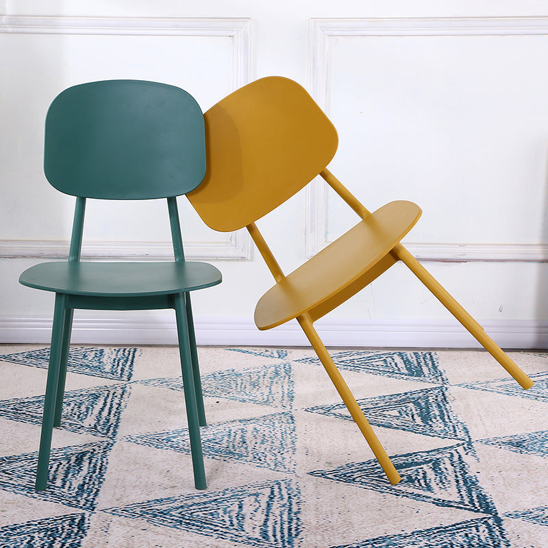 Open rug Armloze eetkamerstoelen Scandinavische plastic eetkamerstoel (set van 4)
