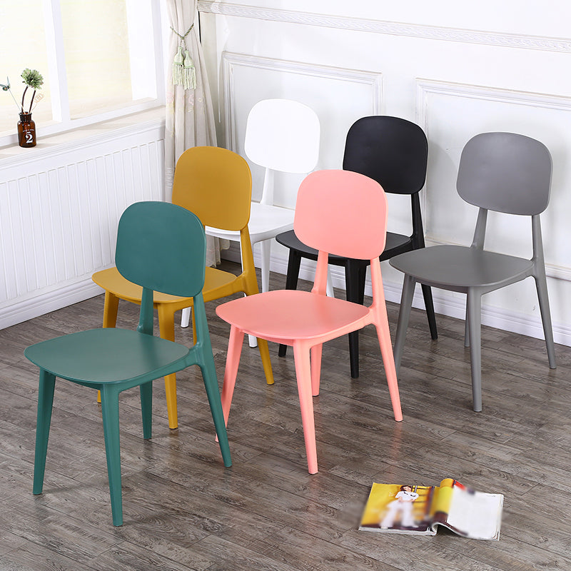 Open rug Armloze eetkamerstoelen Scandinavische plastic eetkamerstoel (set van 4)