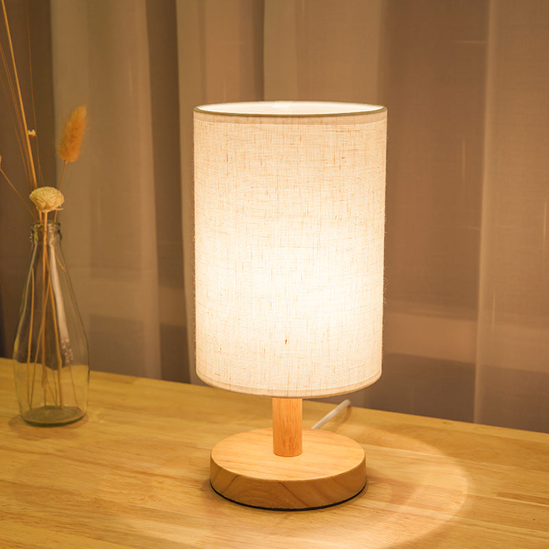 Attività del cilindro in tessuto illuminazione giapponese 1 lampada da lettura in lampadina in bianco/lino con base in legno