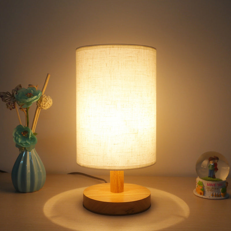 Attività del cilindro in tessuto illuminazione giapponese 1 lampada da lettura in lampadina in bianco/lino con base in legno