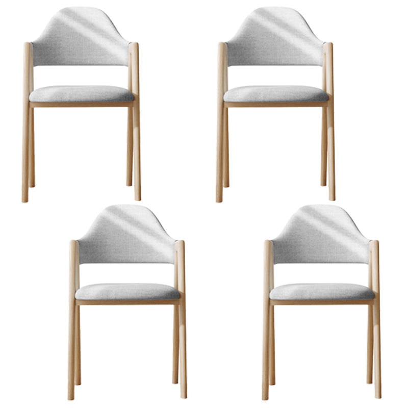 Sillas de comedor modernas Sillón tapizado con respaldo abierto con patas de metal