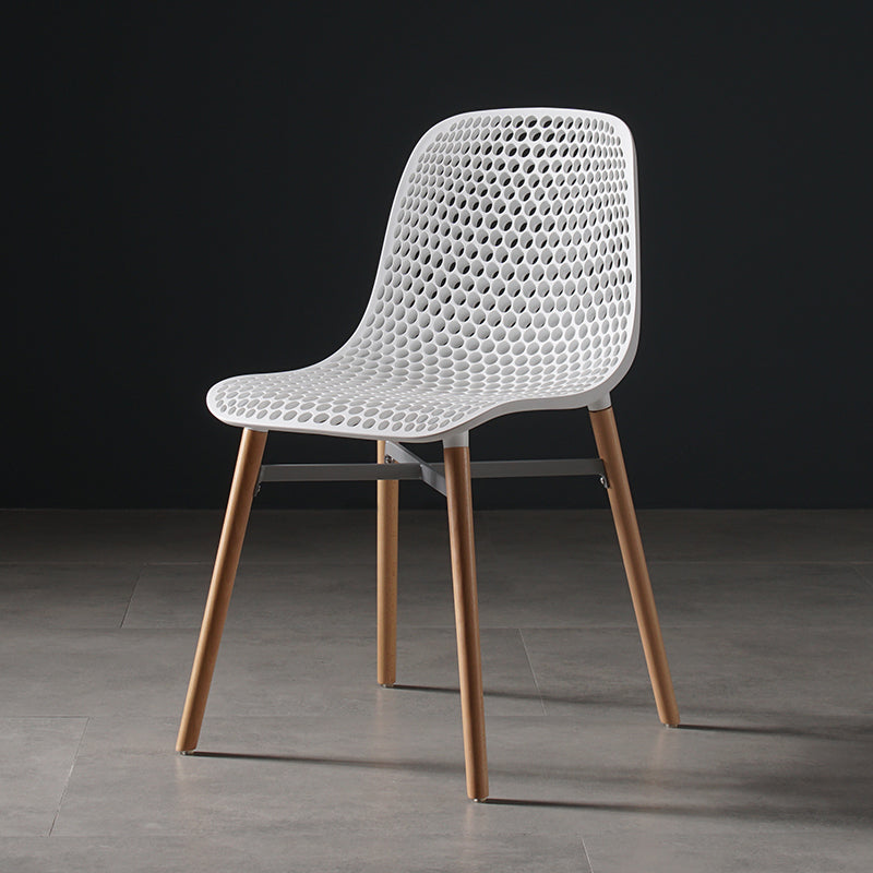 Silla de comedor de plástico de estilo escandinavo, silla sin brazos con respaldo sólido y patas de madera