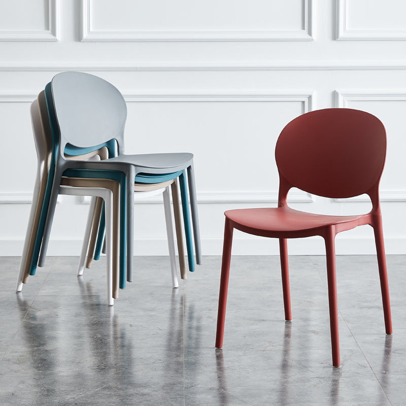 Silla de comedor escandinava de plástico sin brazos, sillas auxiliares apilables (juego de 4)