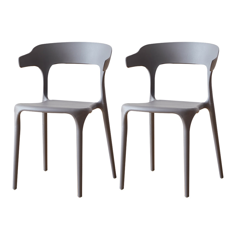 Sillas de comedor plásticas escandinavas sin brazos apilables que cenan la silla lateral