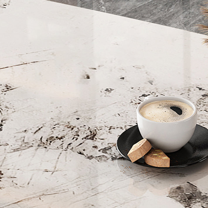 Mesa de comedor de piedra sinterizada de lujo con metal y piedra doble pedestal en oro