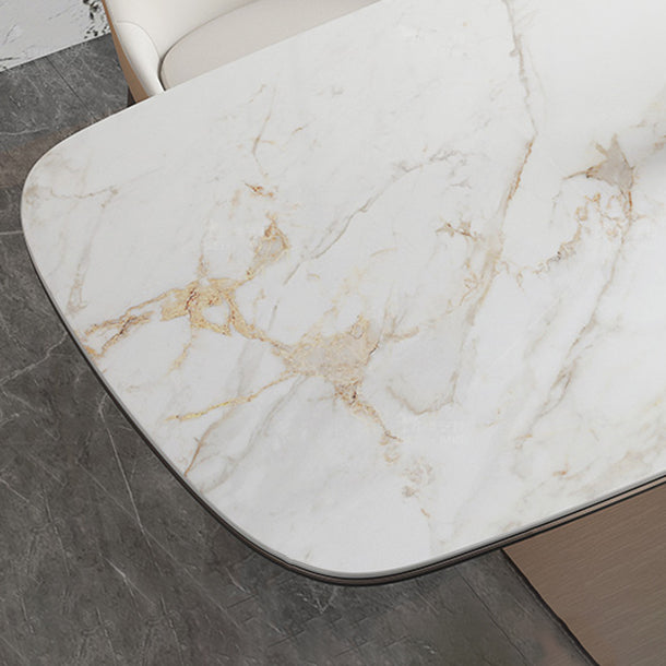 Mesa de comedor de piedra sinterizada de lujo con pedestal de metal en oro rosa