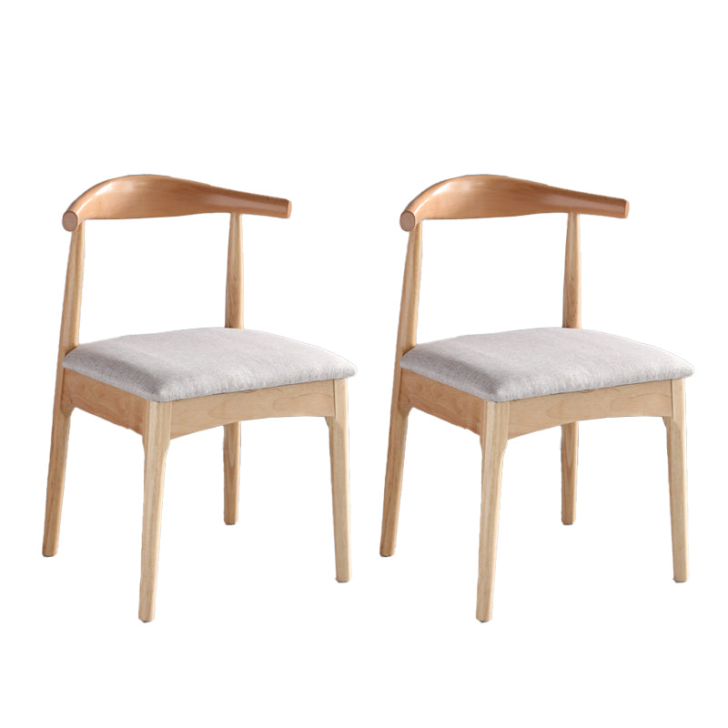 Silla lateral escandinava interior tapizada Silla de comedor de madera con respaldo abierto