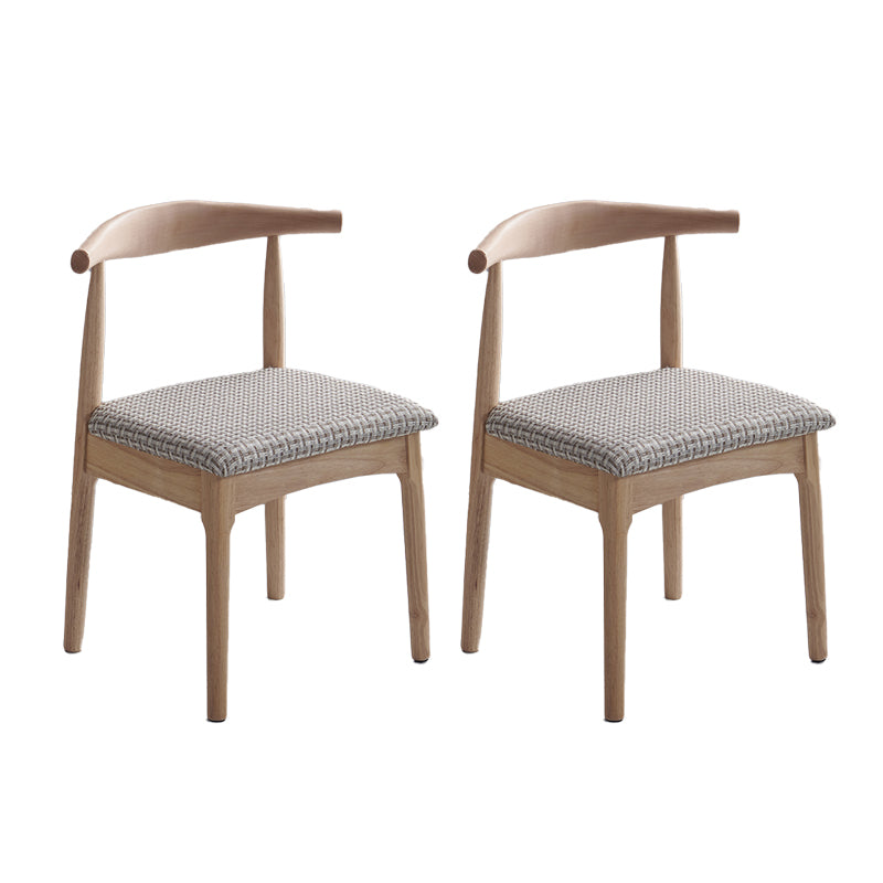 Silla lateral escandinava interior tapizada Silla de comedor de madera con respaldo abierto