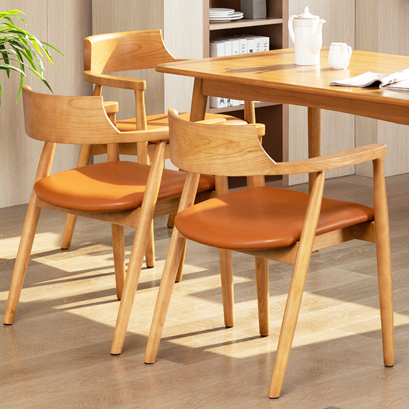 Silla de comedor de cuero contemporánea con respaldo abierto de madera