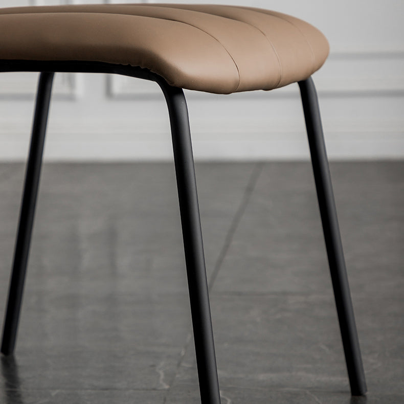 Silla lateral tapizada industrial con respaldo abierto y acabado mate (juego de 4)