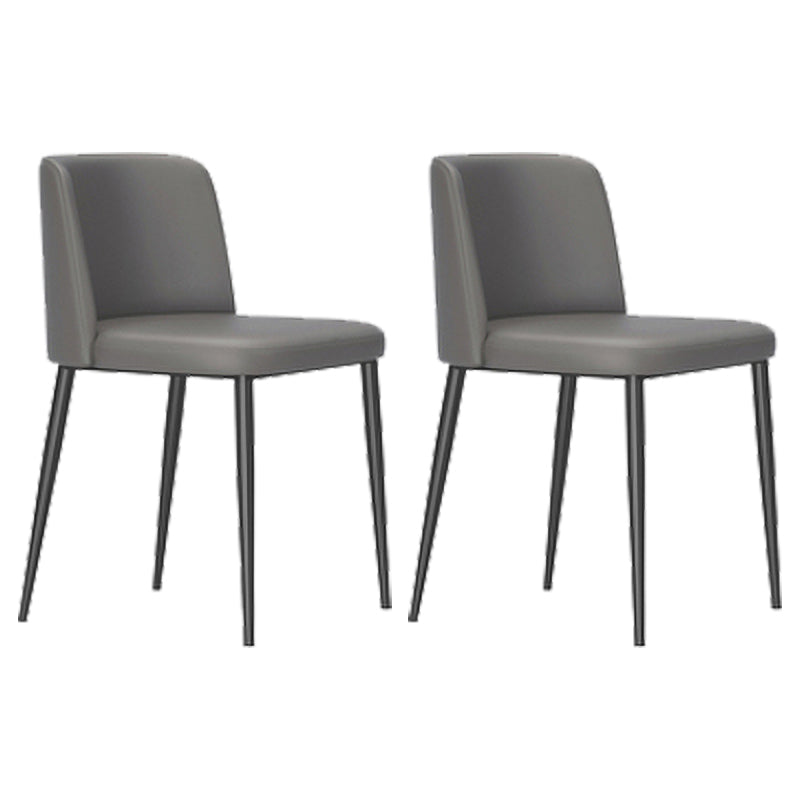 Sillas de comedor de cuero de estilo minimalista Sillas laterales sin brazos con respaldo sólido (juego de 2)