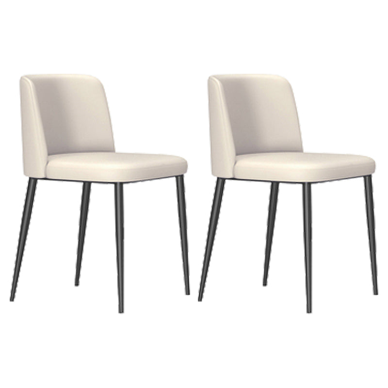 Sillas de comedor de cuero de estilo minimalista Sillas laterales sin brazos con respaldo sólido (juego de 2)