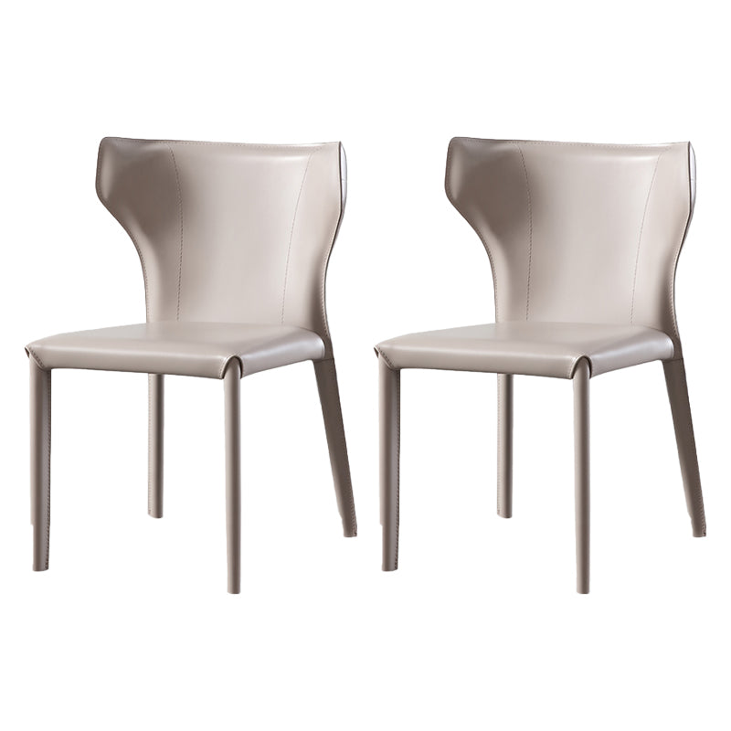 Silla lateral de cuero estilo diseñador para el hogar, silla de comedor con respaldo de orejas y acabado mate (juego de 2)