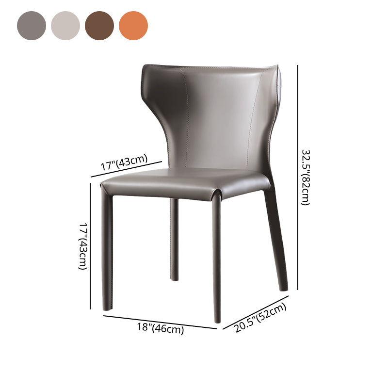 Silla lateral de cuero estilo diseñador para el hogar, silla de comedor con respaldo de orejas y acabado mate (juego de 2)