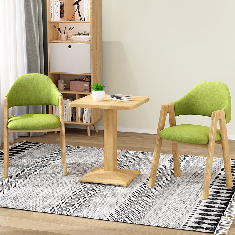 Silla de comedor tapizada escandinava con respaldo abierto y acabado mate (juego de 4)