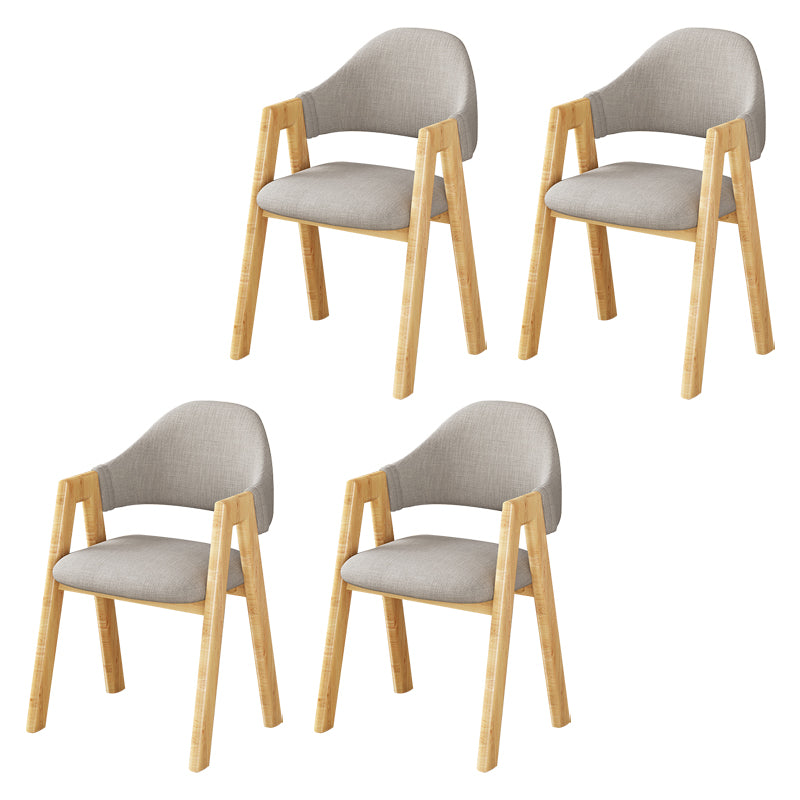 Silla de comedor tapizada escandinava con respaldo abierto y acabado mate (juego de 4)