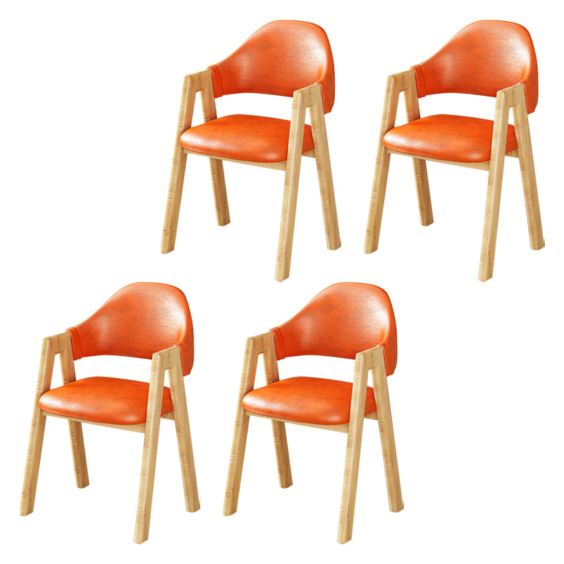 Silla de comedor tapizada escandinava con respaldo abierto y acabado mate (juego de 4)