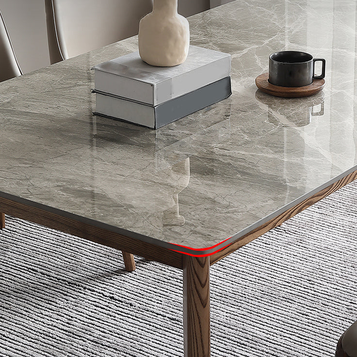 Mesa rectangular con tapa de piedra sinterizada en mesa de cocina gris con base de madera y 4 patas