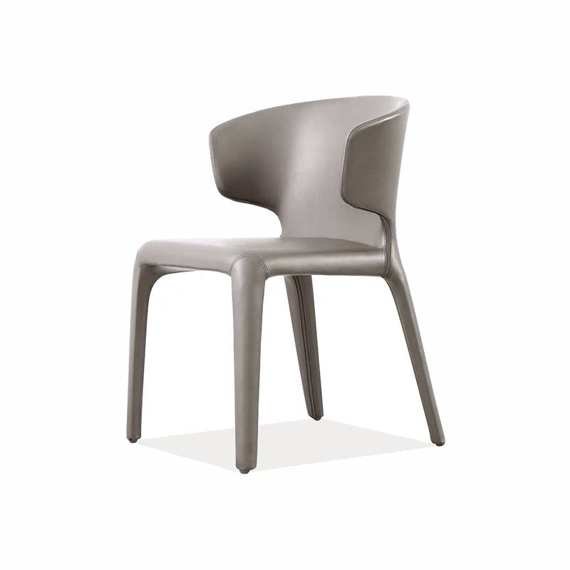 Silla de comedor individual con respaldo sólido y acabado mate de cuero estilo diseñador