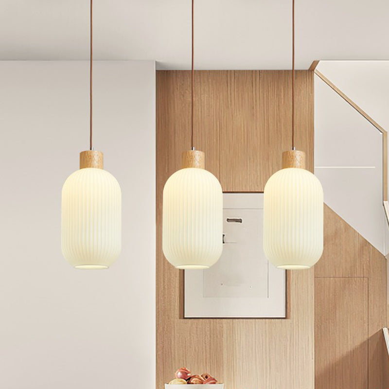 Lampe à suspension géométrique en bois léger créatif moderne avec une teinte en verre blanche