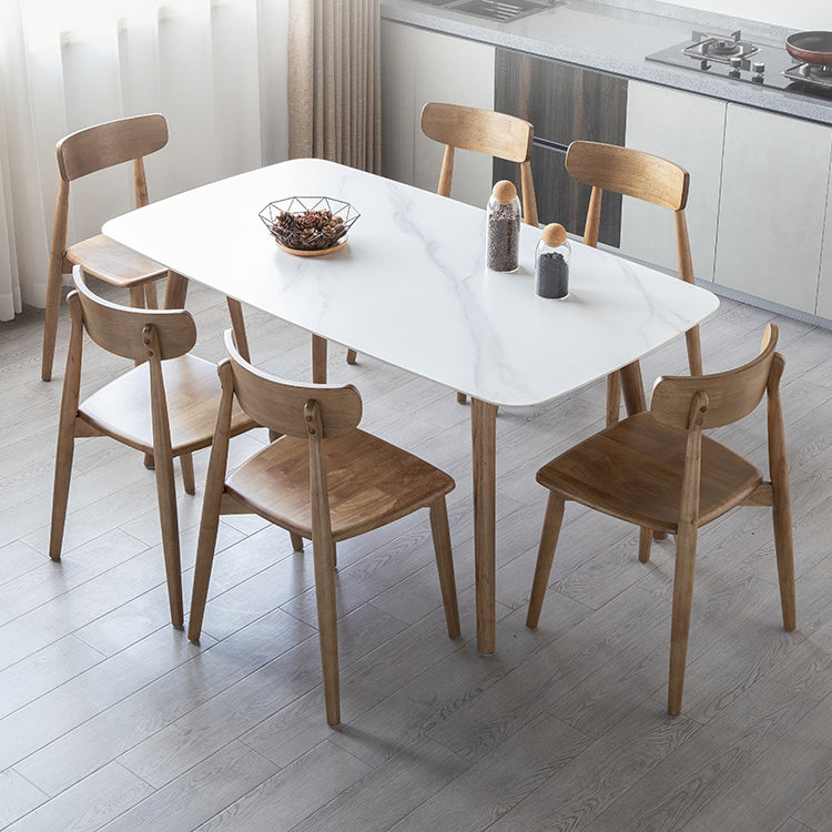Eenvoudig gesinterde stenen eettafel 4 benen houten basis rechthoektafel voor thuis
