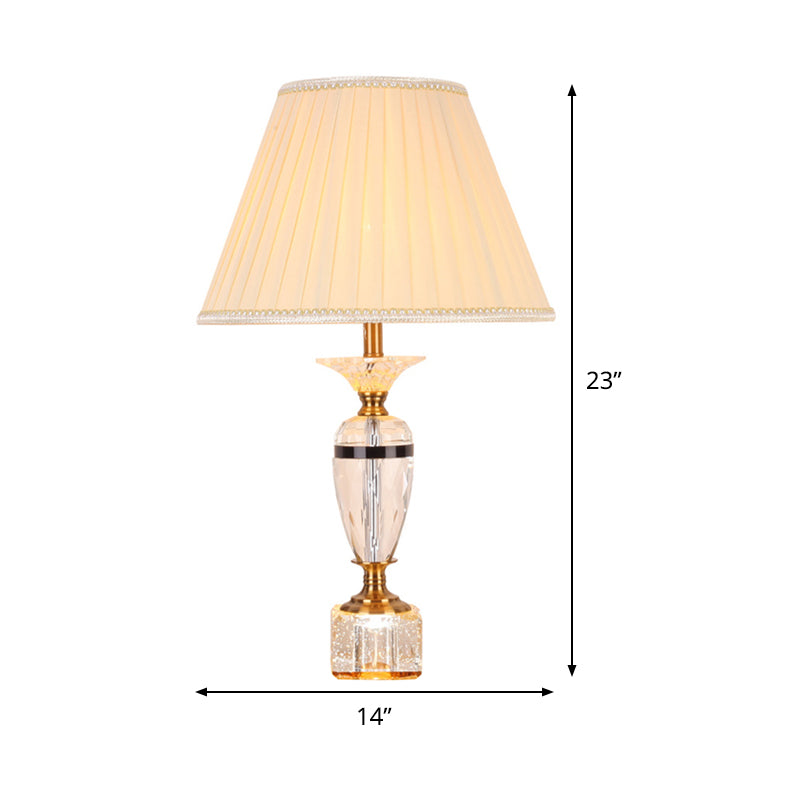 Distallo in tessuto in tessuto Urn Forma Light Modernist Crystal Faceted 1 lampada da tavolo notturno in bulbo in beige