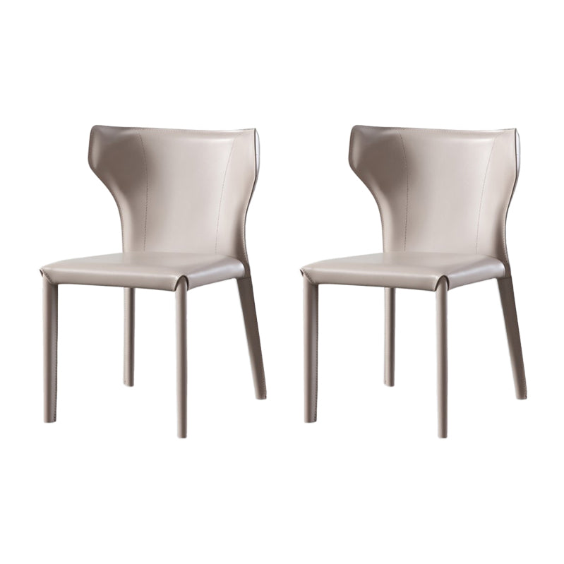 Silla lateral de comedor de cuero de estilo diseñador Silla de comedor Wingback para uso doméstico