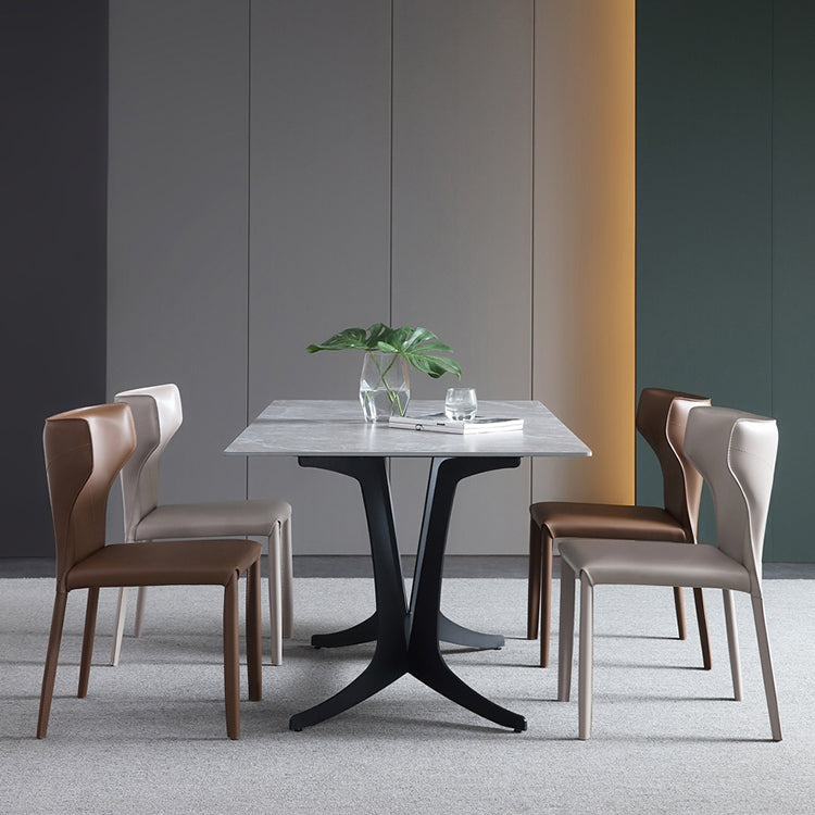 Silla lateral de comedor de cuero de estilo diseñador Silla de comedor Wingback para uso doméstico