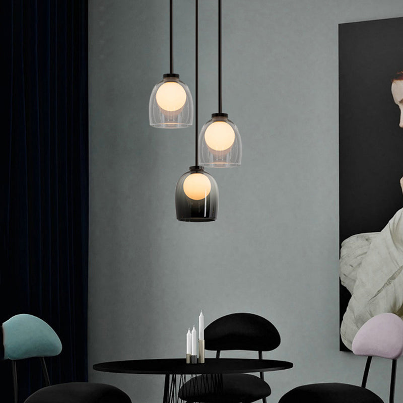 Lampe suspendue à la cloche en verre dans un pendentif en fer forgé moderne pour chambre à coucher