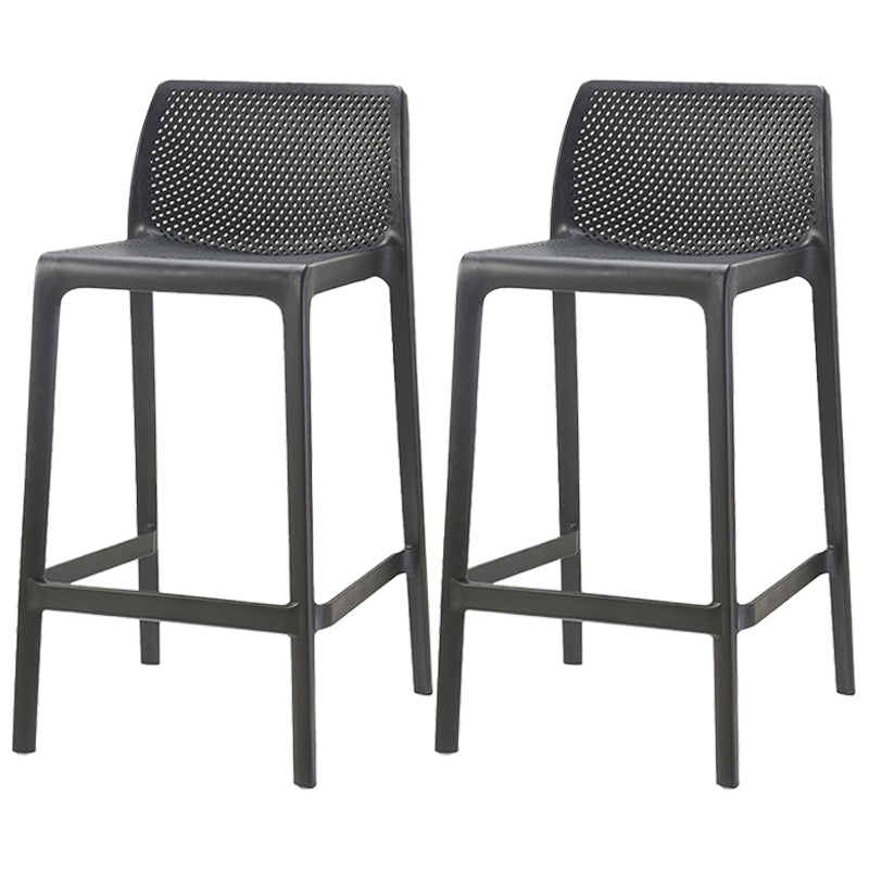 Taburetes de bar interiores apilables de plástico escandinavo con respaldo bajo