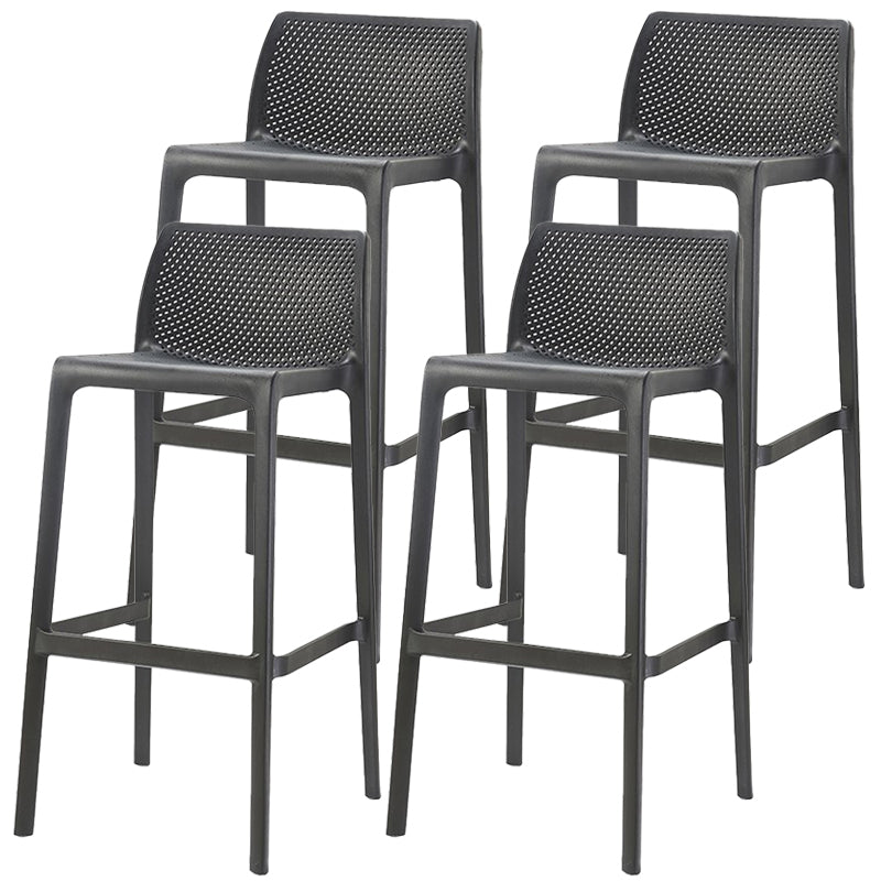 Taburetes de bar interiores apilables de plástico escandinavo con respaldo bajo