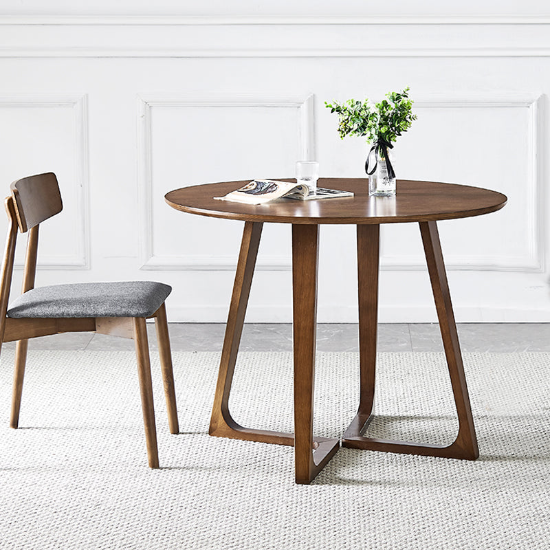 Mesa redonda de ashwood brown sencilicidad de doble pedestal para comedor