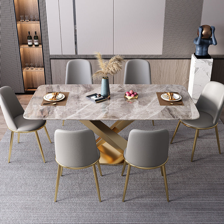 Mesa de comedor de lujo tradicional rectángulo mesa de piedra sinterizada gris con base de pedestal dorado