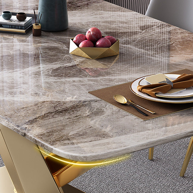 Mesa de comedor de lujo tradicional rectángulo mesa de piedra sinterizada gris con base de pedestal dorado