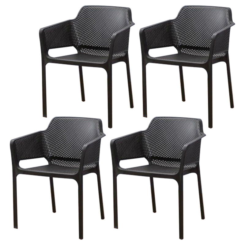 El plástico escandinavo que cena el brazo preside los sillones de cena interiores apilables