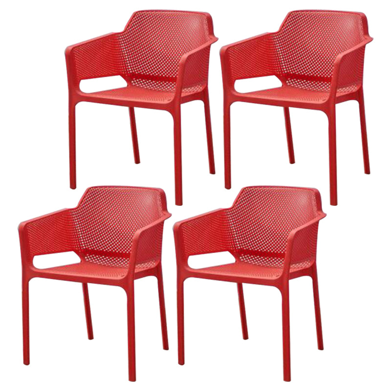 El plástico escandinavo que cena el brazo preside los sillones de cena interiores apilables