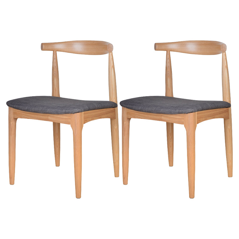 Silla lateral escandinava con respaldo abierto Silla de comedor tapizada con acabado mate