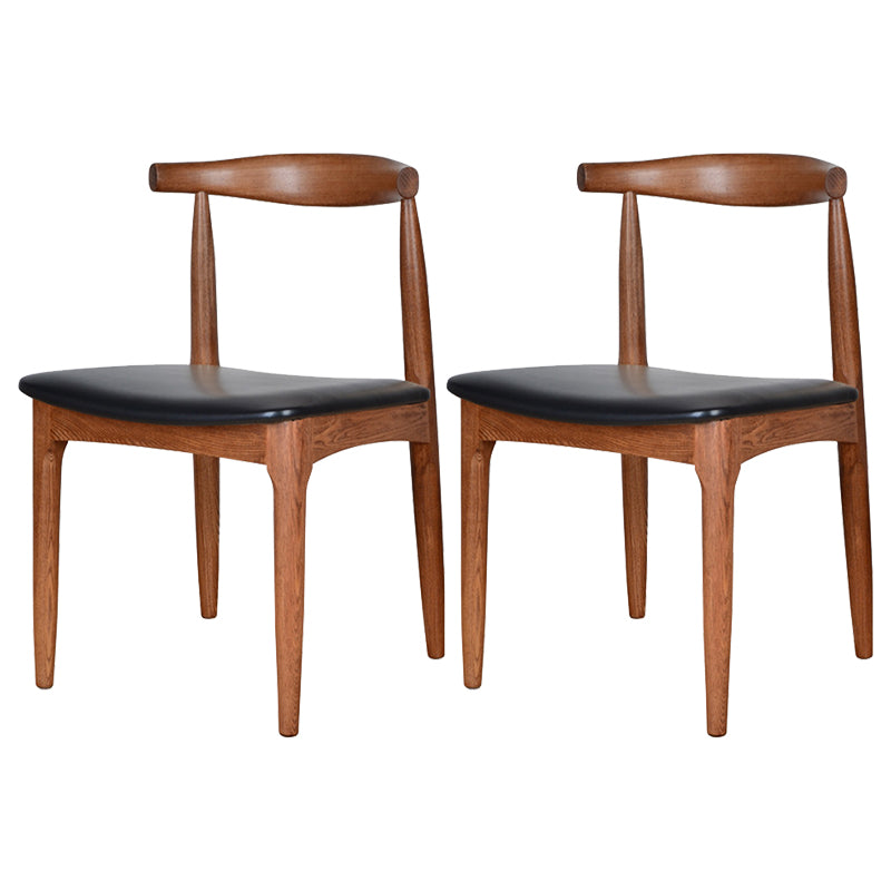 Silla lateral escandinava con respaldo abierto Silla de comedor tapizada con acabado mate
