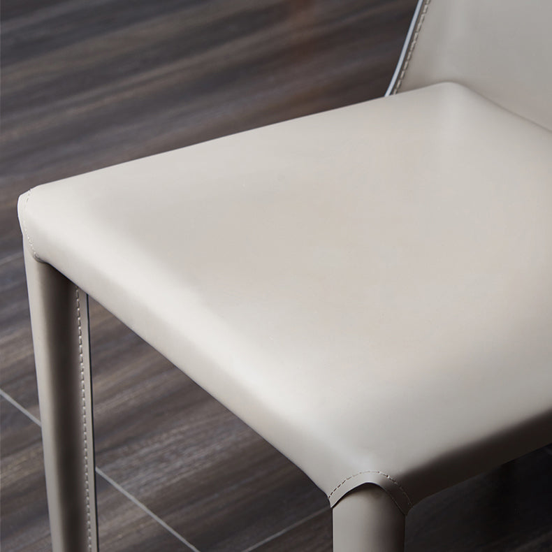 Silla auxiliar de comedor contemporánea Silla de respaldo sólido sin brazos Brasserie de cuero