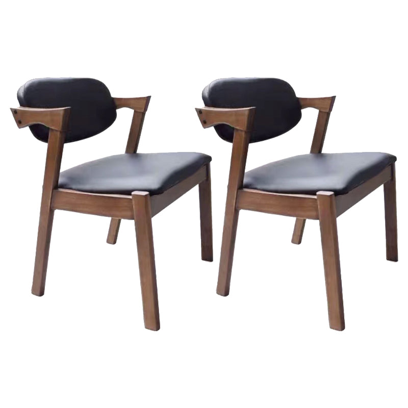 Silla de comedor de cuero natural con respaldo abierto de cocina contemporánea