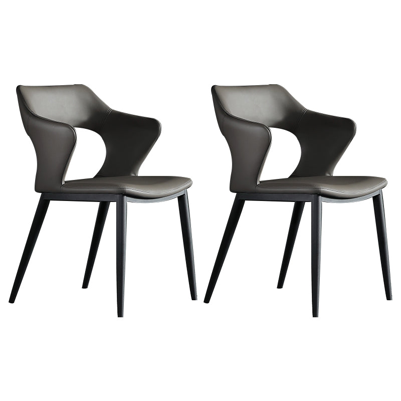 Sillones de comedor de cuero Sillas tapizadas con brazos con respaldo abierto y patas de metal