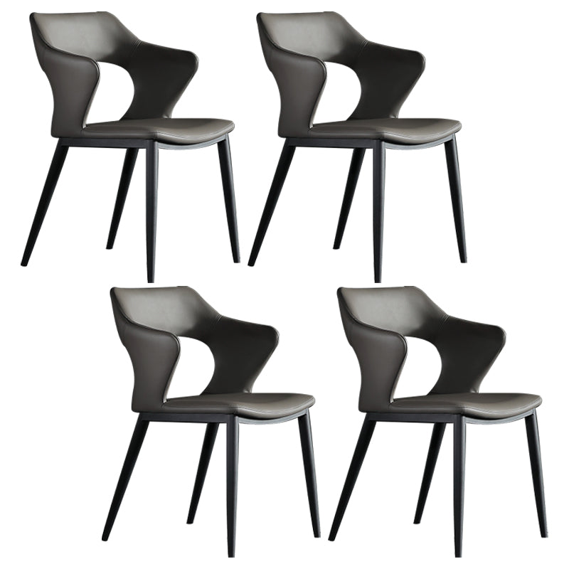 Sillones de comedor de cuero Sillas tapizadas con brazos con respaldo abierto y patas de metal