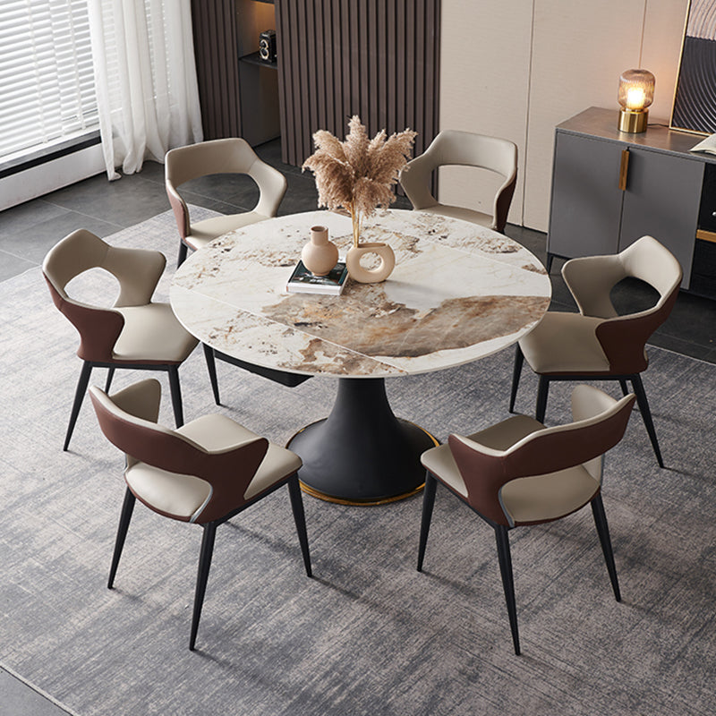 Mesa de comedor de piedra sinterizada de lujo con base de metal negro