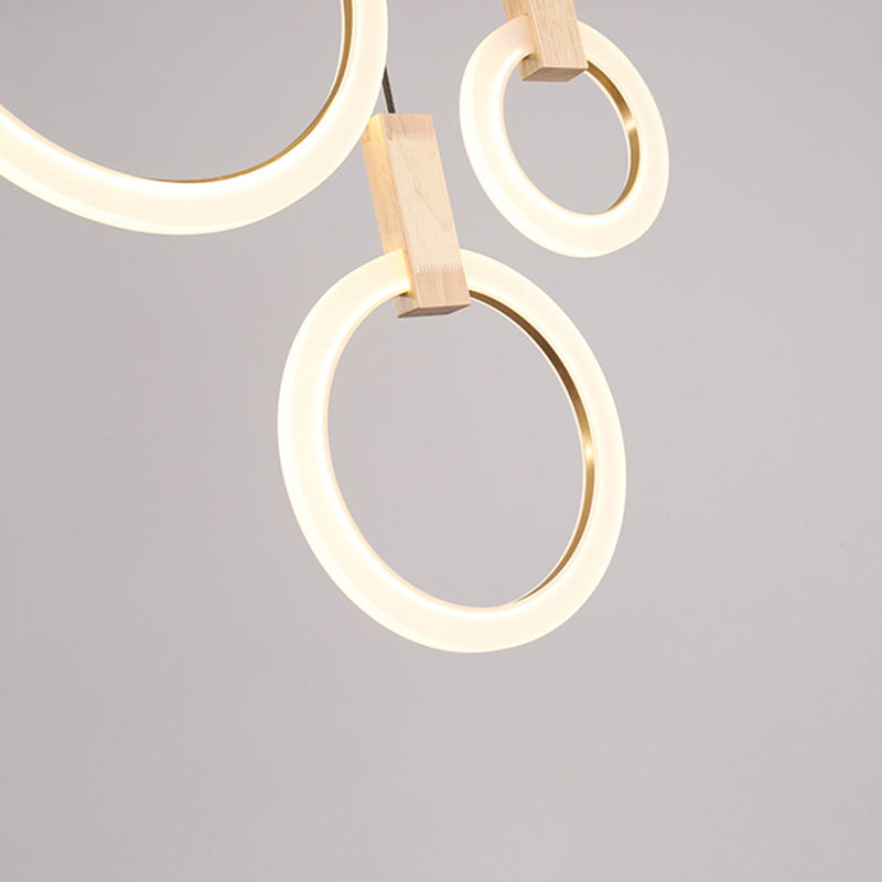 Enclaceur de cercles en bois massif pendentif