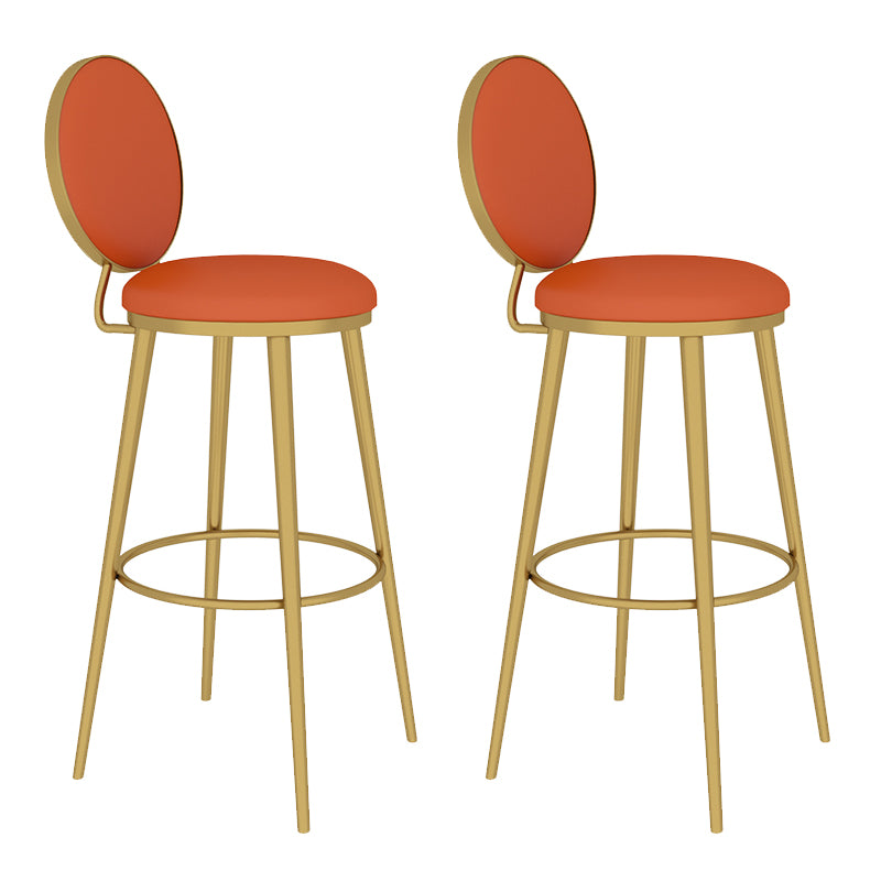 Taburete redondo Glam, taburete de bar de cuero sin brazos con respaldo bajo y patas de metal