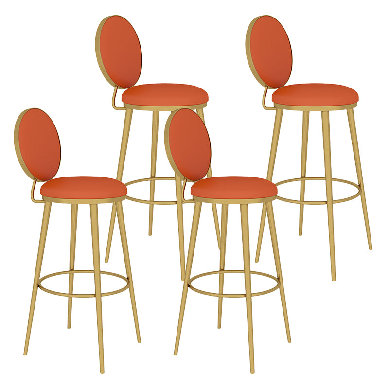 Taburete redondo Glam, taburete de bar de cuero sin brazos con respaldo bajo y patas de metal