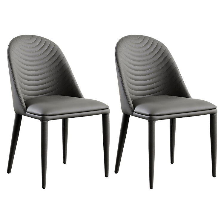 Silla sin brazos curvada de cuero moderna con acabado mate Parsons